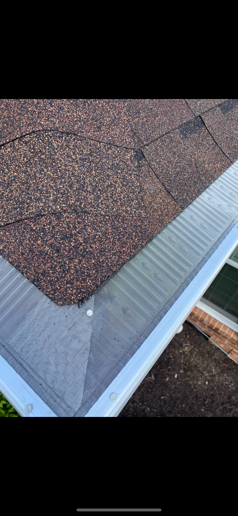 Damaged gutters needing repair
